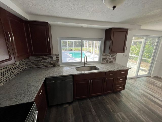 8206 CLOVER HILL LOOP, Hudson, FL 34667