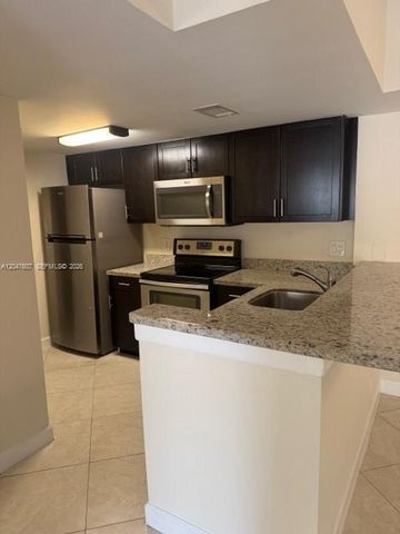10725 Cleary Boulevard 211, Plantation, FL 33324