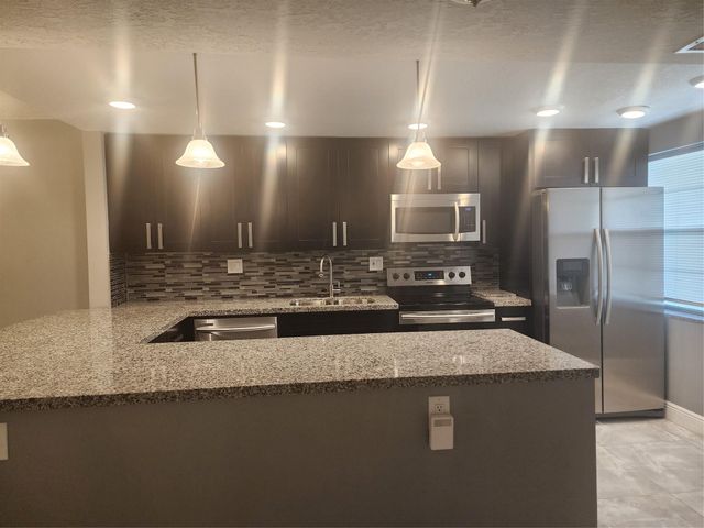 8205 NW 61st Street NW B202, Tamarac, FL 33321