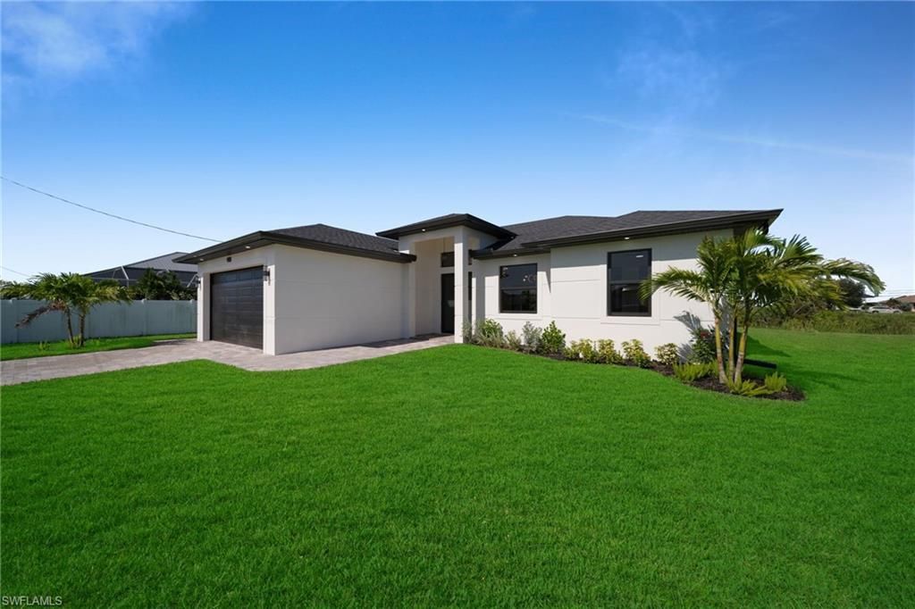 908 NE 11th AVE, CAPE CORAL, FL 33909 — photo 2