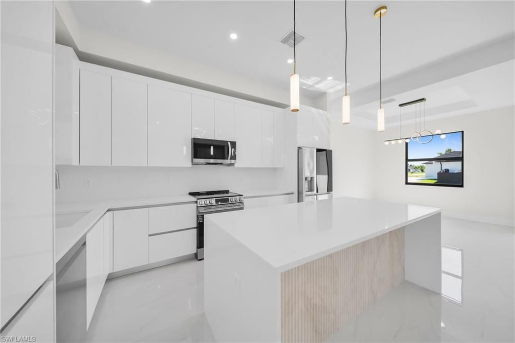 908 NE 11th AVE, CAPE CORAL, FL 33909 — photo 5