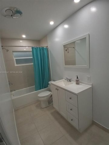 1250 E Sample Rd 303, Pompano Beach, FL 33064