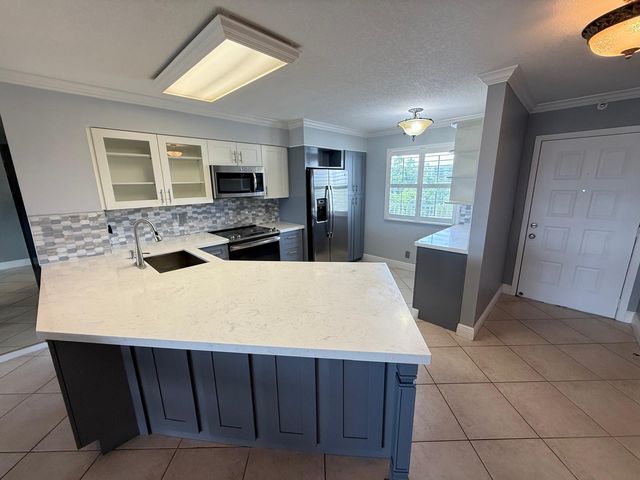 2215 CYPRESS ISLAND Drive 505, Pompano Beach, FL 33069