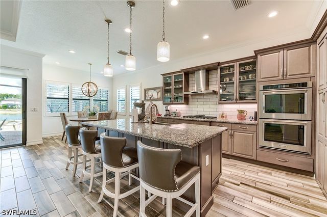 9327 Woodhurst DR, Naples, FL 34120