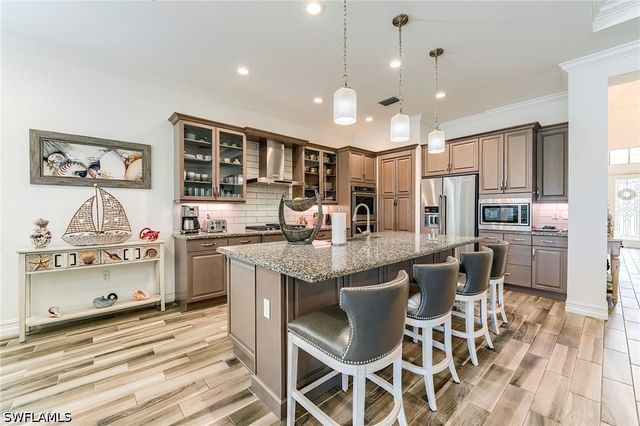 9327 Woodhurst DR, Naples, FL 34120