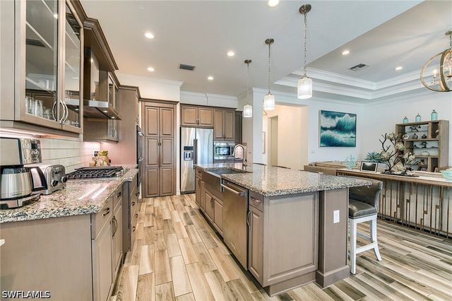 9327 Woodhurst DR, Naples, FL 34120