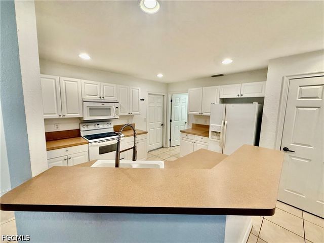 103 E 11th ST, Lehigh Acres, FL 33972