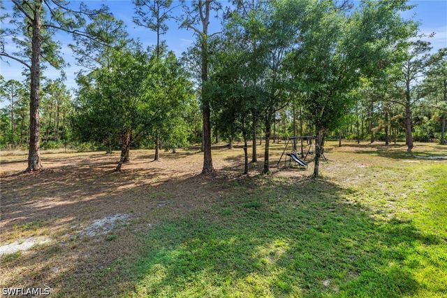 3026 64th AVE NE, Naples, FL 34120