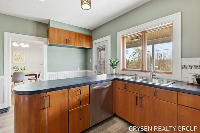 5527 W River Drive Ne, Plainfield Twp, MI 49321