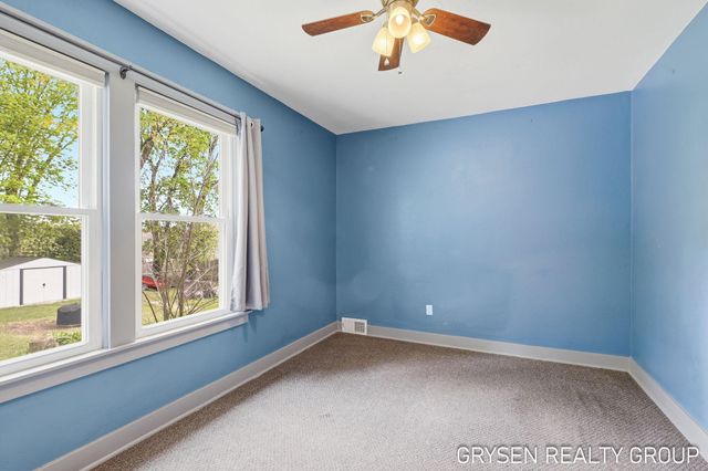 5527 W River Drive Ne, Plainfield Twp, MI 49321