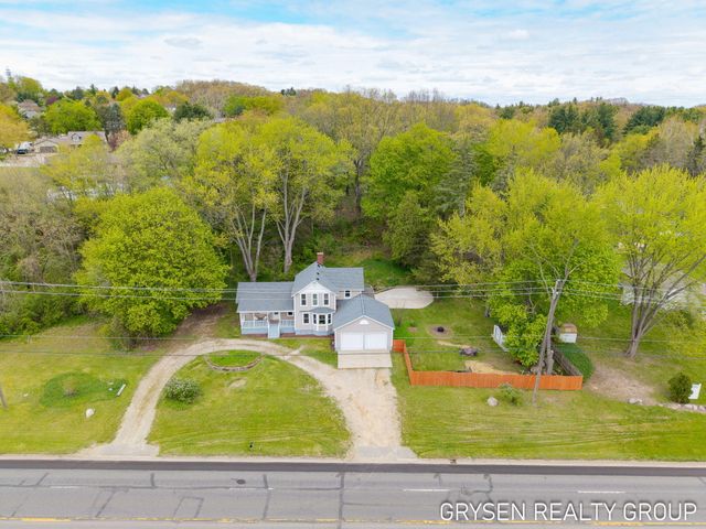 5527 W River Drive Ne, Plainfield Twp, MI 49321