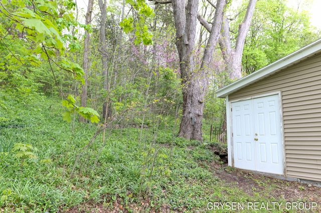 5527 W River Drive Ne, Plainfield Twp, MI 49321