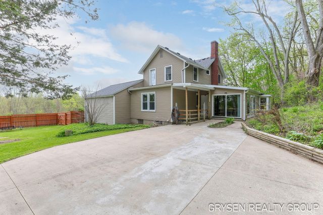 5527 W River Drive Ne, Plainfield Twp, MI 49321