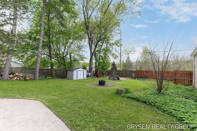 5527 W River Drive Ne, Plainfield Twp, MI 49321
