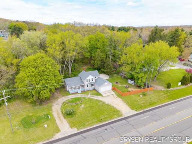 5527 W River Drive Ne, Plainfield Twp, MI 49321