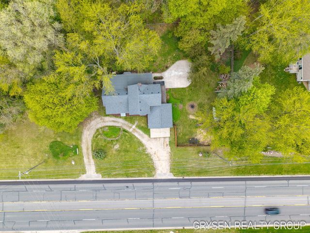 5527 W River Drive Ne, Plainfield Twp, MI 49321