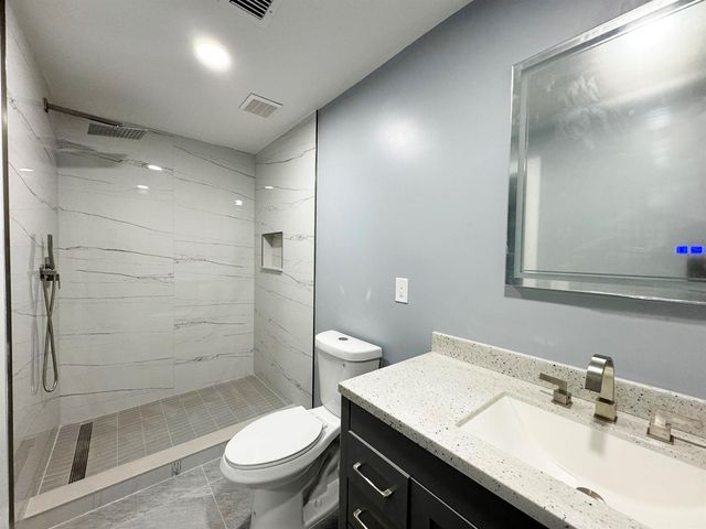 702 NE Lanfair Street, Port St. Lucie, FL 34983