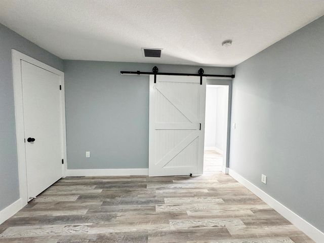 702 NE Lanfair Street, Port St. Lucie, FL 34983