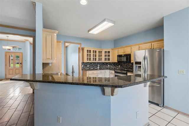 1413 Copperfield Drive, Edmond, OK 73003