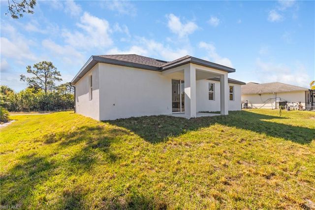 1109 Cumming ST E, Lehigh Acres, FL 33974