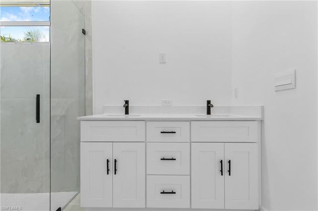 1109 Cumming ST E, Lehigh Acres, FL 33974