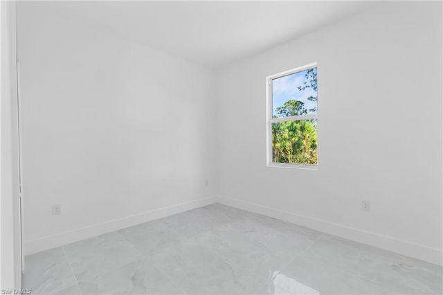 1109 Cumming ST E, Lehigh Acres, FL 33974