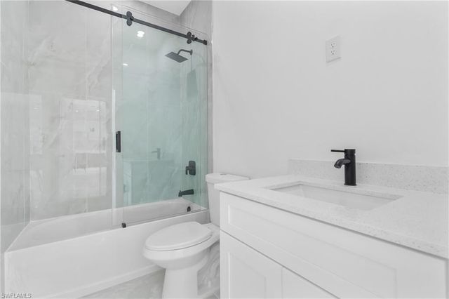 1109 Cumming ST E, Lehigh Acres, FL 33974