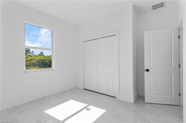 1109 Cumming ST E, Lehigh Acres, FL 33974