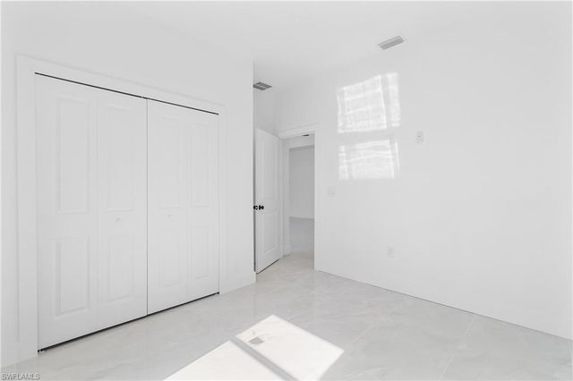 1109 Cumming ST E, Lehigh Acres, FL 33974