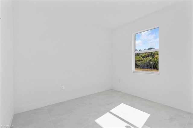 1109 Cumming ST E, Lehigh Acres, FL 33974