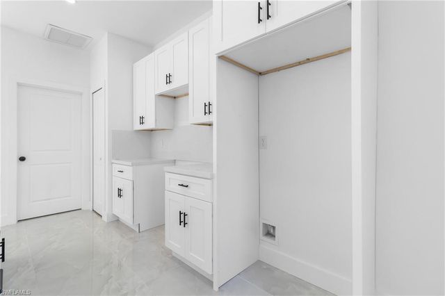 1109 Cumming ST E, Lehigh Acres, FL 33974