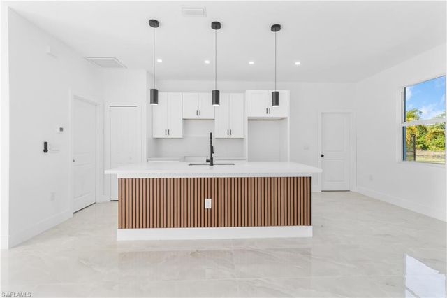 1109 Cumming ST E, Lehigh Acres, FL 33974