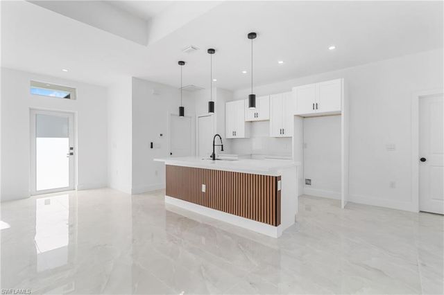 1109 Cumming ST E, Lehigh Acres, FL 33974