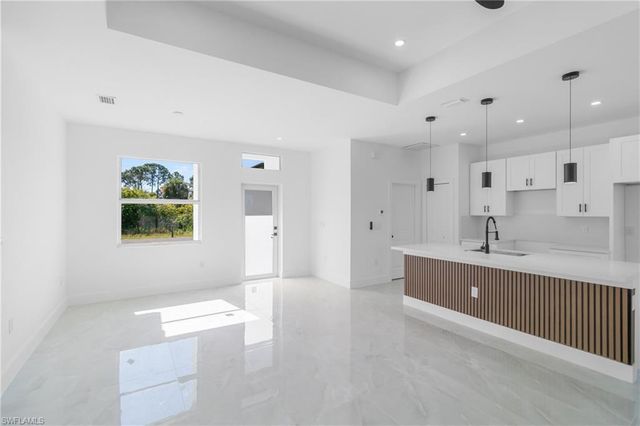 1109 Cumming ST E, Lehigh Acres, FL 33974