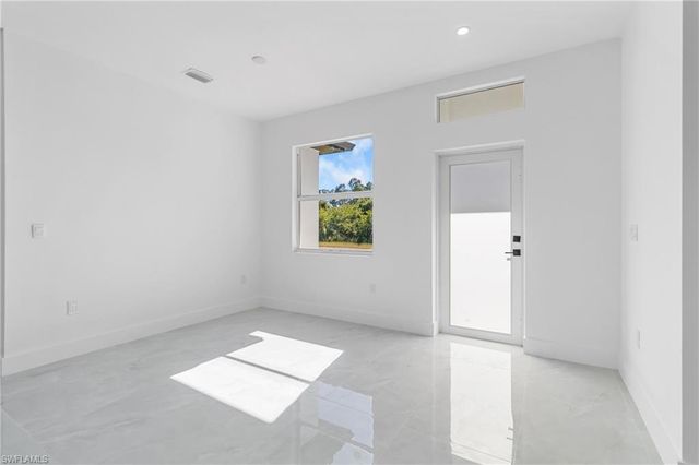 1109 Cumming ST E, Lehigh Acres, FL 33974