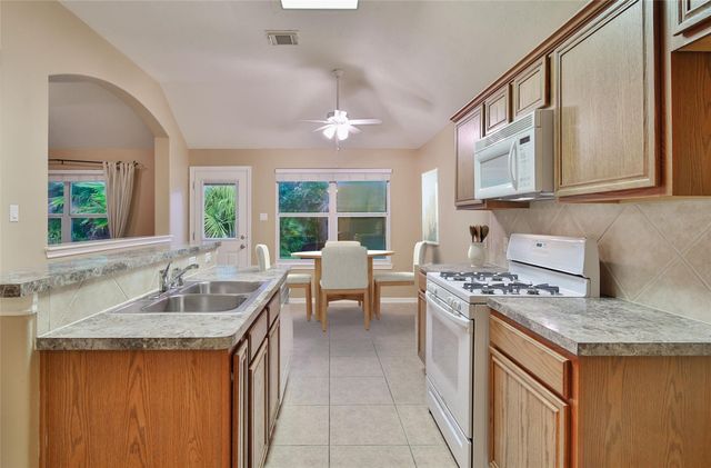 11014 Creekline Meadow Court, Cypress, TX 77429