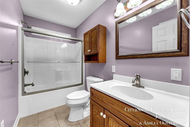 11725 Wabasis Lake Drive, Greenville, MI 48838