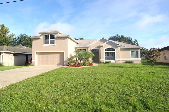 25 BIRD OF PARADISE DRIVE, Palm Coast, FL 32137