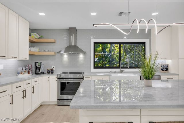 3155 64th ST SW, Naples, FL 34105