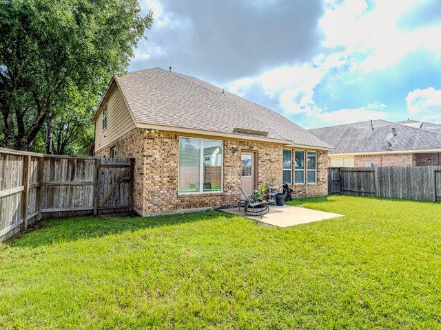 8119 Sweetstone Grove Court, Cypress, TX 77433