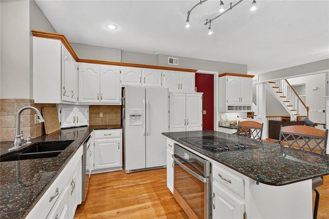 7560 Eicher Drive, Shawnee, KS 66217