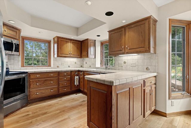 12655 N River Forest CIRCLE, Mequon, WI 53092