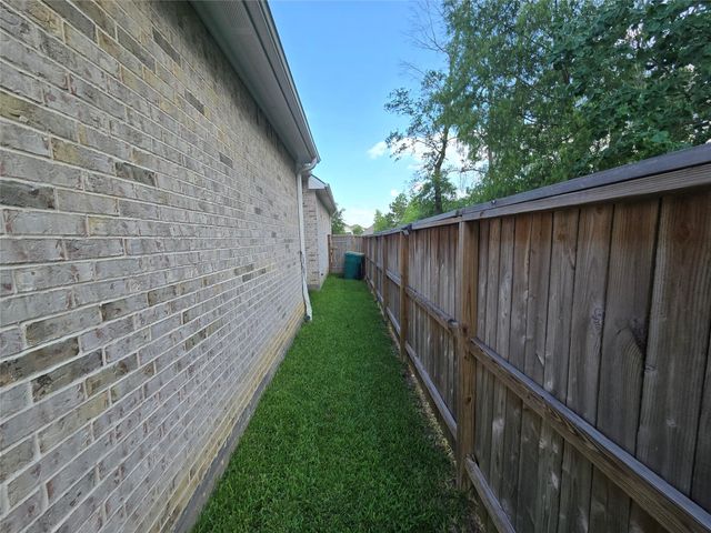 3205 Climbing Gardens Court, Conroe, TX 77301