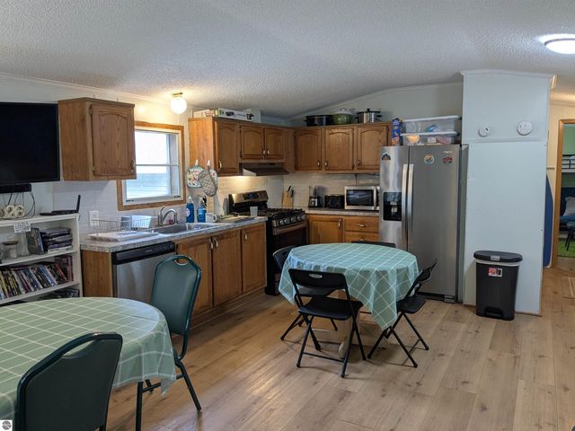 7610 Windoga Lake Drive, Weidman, MI 48893