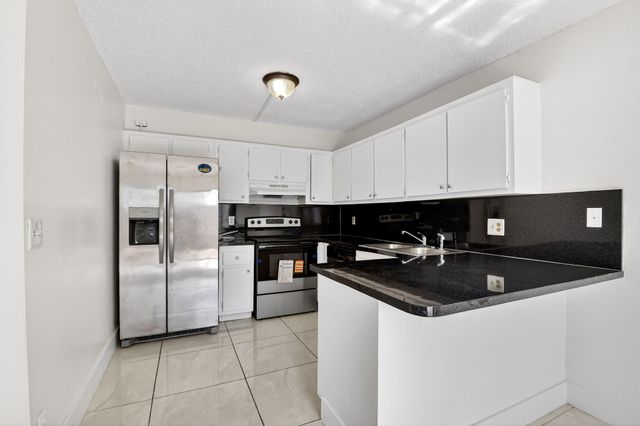 136 Woodland Road, Palm Springs, FL 33461