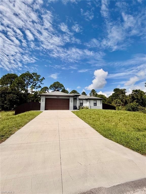 724 Drury AVE, LEHIGH ACRES, FL 33974 — photo 2