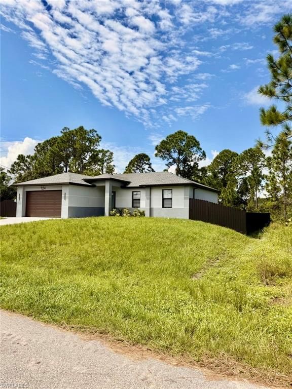 724 Drury AVE, LEHIGH ACRES, FL 33974 — photo 4