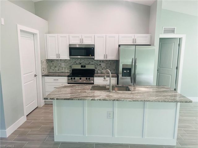 4169 NW 38th PL, Cape Coral, FL 33993