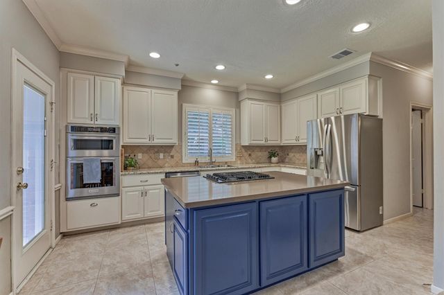 14 Feather Branch Court, The Woodlands, TX 77381