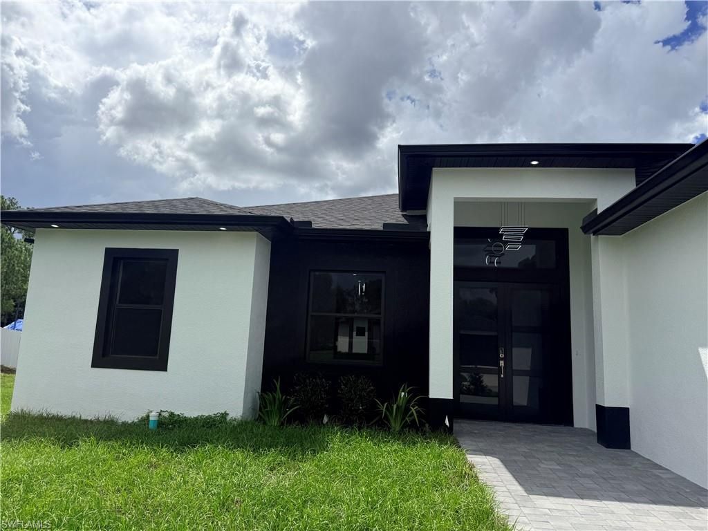 1409 Roosevelt AVE, LEHIGH ACRES, FL 33972 — exterior